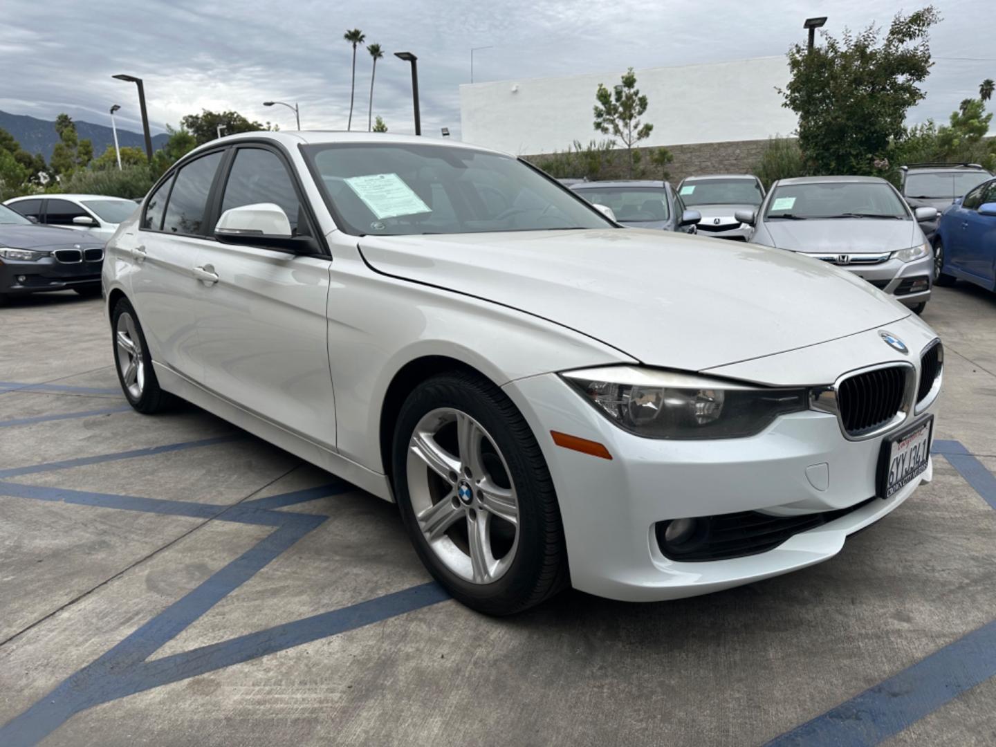 2013 White BMW 3-Series 328i Sedan (WBA3C1C52DF) with an 2.0L L4 DOHC 16V engine, AUTOMATIC transmission, located at 30 S. Berkeley Avenue, Pasadena, CA, 91107, (626) 248-7567, 34.145447, -118.109398 - Crown City Motors is a used “Buy Here Pay Here” car dealer in Pasadena CA. “Buy Here Pay Here” financing, means that when you purchase your vehicle from our dealership, that you make the payments to the dealership as well. We do not need the banks approval to get you approved for a used auto - Photo#8